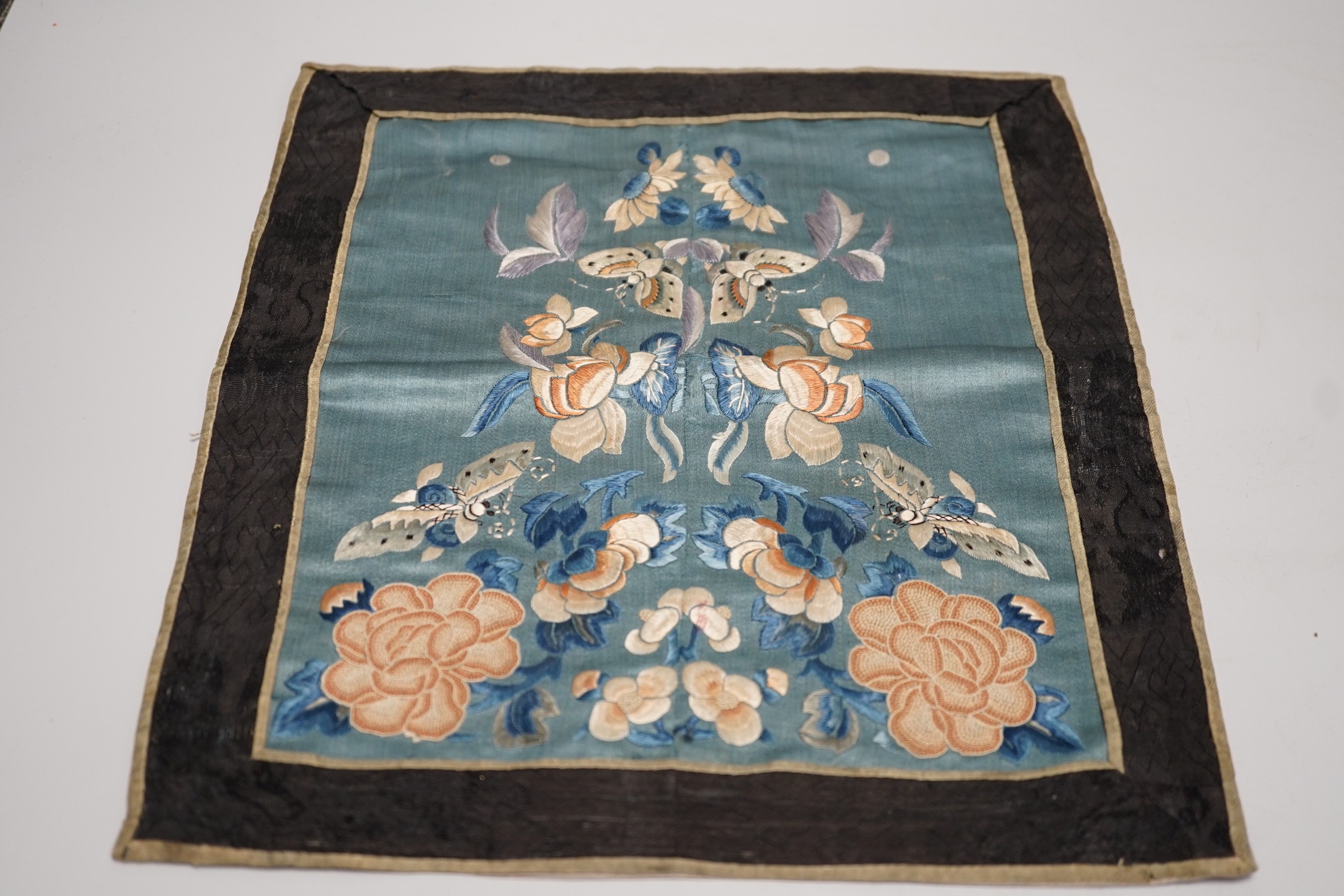 Three Chinese embroideries, including a Buddhist hanging